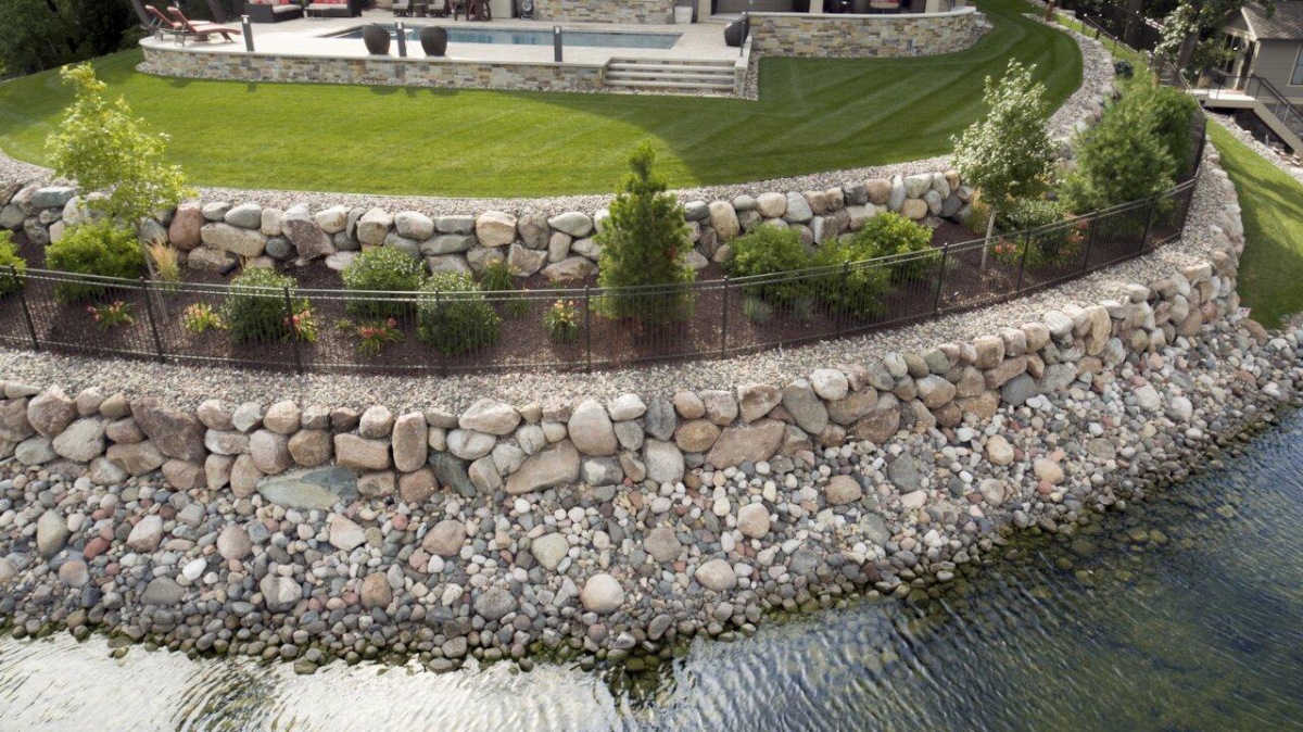Vinyl seawall and riprap shoreline erosion control construction on Gulf Coast waterfront property